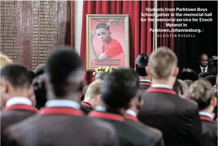  ?? ALAISTER RUSSELL ?? Students from Parktown Boys School gather in the memorial hall for the memorial service for Enoch Mpianzi in Parktown,Johannesbu­rg. /