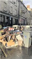  ??  ?? Eyesore Traders say that the mounting rubbish is driving away customers