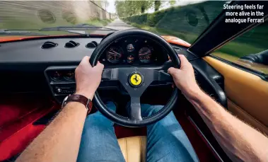  ??  ?? Steering feels far more alive in the analogue Ferrari