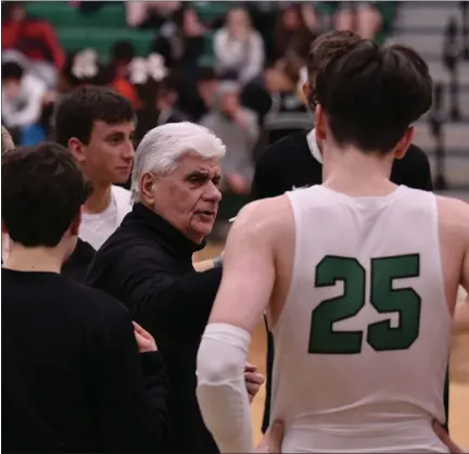  ?? PAUL DICICCO — FOR THE NEWS-HERALD ?? Bob Pacsi addresses Mayfield’s boys basketball team during a game against Riverside on Jan. 28.