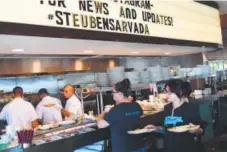  ??  ?? Steuben’s, which recently opened in Arvada, sits inside a renovated Gunther Toody’s diner.