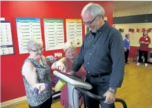  ?? JESSICA NYZNIK/PETERBOROU­GH EXAMINER ?? Bill Charters, president of Activity Haven's board of directors, is joined by Heather Leveck, Activity Haven's interim executive director, middle, and Shirley Shaw, Activity Haven executive director, during a workout on a vibration technology (VT)...