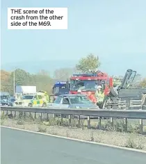  ??  ?? THE scene of the crash from the other side of the M69.