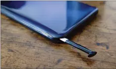  ??  ?? The G Pro comes with a stylus that slides neatly into the right corner of its frame.