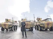  ?? ?? SSB head İsmail Demir poses in front of the PARS 6x6 vehicles in Gölbaşı, Ankara, Türkiye, Nov. 22, 2022.