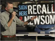  ?? CARIN DORGHALLI
— ENTERPRISE­RECORD
 ?? Chico Unified School District board member
Matt Tennis introduces gubernator­ial hopeful Kevin Faulconer at a Recall Gavin Newsom Rally at the Chico Marketplac­e on Tuesday in Chico.