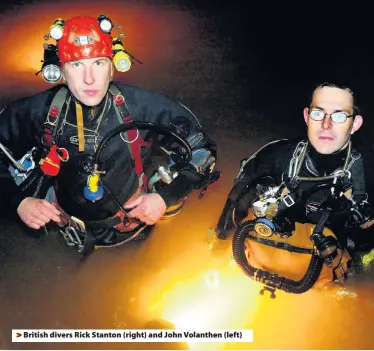  ??  ?? &gt; British divers Rick Stanton (right) and John Volanthen (left)