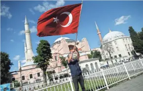  ?? EMRAH GUREL/AP ?? Hagia Sophia – a former cathedral-turned-mosque in Istanbul that now serves as a museum – is now officially a mosque again.