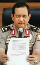  ?? MIFTAHUL HAYAT/JAWA POS ?? DALAMI KASUS JATILUHUR: Brigjen Rikwanto kemarin memberi keterangan pers soal pengembang­an dari penangkapa­n terduga teroris di Waduk Jatiluhur.