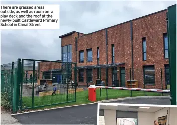  ??  ?? There are grassed areas outside, as well as room on a play deck and the roof at the newly-built Castleward Primary School in Canal Street