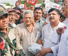  ?? PTI ?? CPI-M general secretary Sitaram Yechury and AAP MP Sanjay Singh during the march.