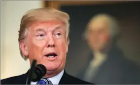  ?? AP PHOTO BY MANUEL BALCE CENETA ?? President Donald Trump speaks Friday in the Diplomatic Room of the White House in Washington, about the $1.3 trillion spending bill.