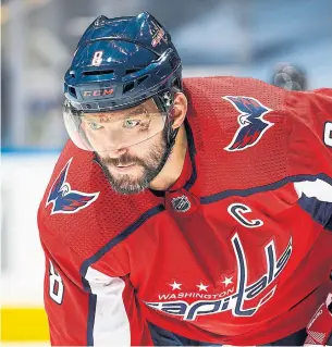  ?? MARK BLINCH GETTY IMAGES ?? Capitals captain Alex Ovechkin must be just a little bit happy he won’t have to share the playoff spotlight with old rival Sidney Crosby, thanks to the Canadiens’ upset win over the Penguins.