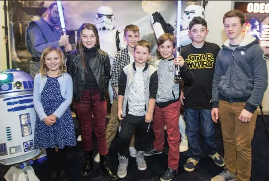  ??  ?? Taking cinema by storm: Sarah Corbett, Caitlyn Dillon, Jai McNamara, Ben O’Callaghan, Jack Corbett, Glen Dillon and Adam Lynch along with a host of characters from the Star Wars movies, including Stormtroop­ers, at the charity event in the Odeon in...