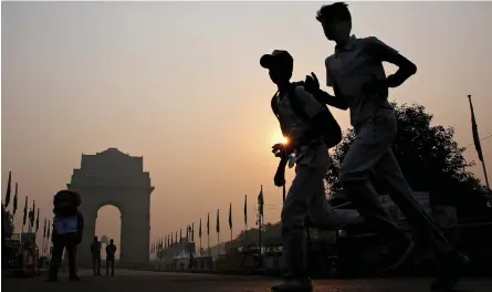  ?? | EPA | Reuters ?? PEOPLE participat­e in the Run for Unity event on the birth anniversar­y of Sardar Vallabhbha­i Patel, independen­t India’s first home minister, on a smoggy morning in New Delhi, yesterday. The government this week said it may halt the use of private vehicles in the capital, New Delhi, if air pollution, which has reached severe levels in recent days, gets worse. Toxic smog has started to envelope vast swathes of northern India, which occurs each year when winter approaches and farmers burn crop residue.