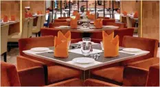  ??  ?? The Palate in Ramada Plaza offers a luxe dining experience; ( below) Pizzeria Vaatika Café serves continenta­l fare; ( bottom) Prinsep Bar in Taj Ganges.