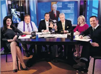  ?? GETTY IMAGES/FILES ?? Kimberly Guilfoyle became nationally known as a member of The Five on Fox News, here interviewi­ng television personalit­y Alex Trebek, third from right, in 2014. Guilfoyle was always seated on the left.