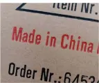  ?? FOTO: DPA ?? In vielen Kleidungss­tücken steht der Hinweis „Made in China“.