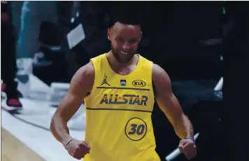  ?? BRYNN ANDERSON — THE ASSOCIATED PRESS ?? Warriors guard Stephen Curry celebrates after winning the 3-point contest at the NBA All-Star Game in Atlanta.