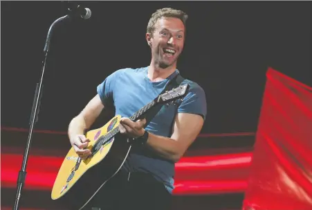  ?? ANGELA WEISS/AFP VIA GETTY IMAGES ?? Coldplay’s Chris Martin streamed a concert for people stuck at home ... and other musicians are following suit.