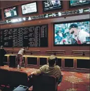  ?? John Locher Associated Press ?? LAS VEGAS sportsbook­s such as South Point, shown in 2018, had bettors interested in new NBA odds.