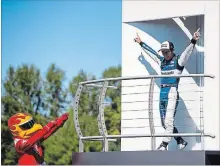  ?? ASSOCIATED PRESS FILE PHOTO ?? Takuma Sato of Japan celebrates his win in the IndyCar race Sunday in Portland, Ore. Sato called it one of the most beautiful days in his life.