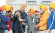  ?? REUTERS ?? Canada’s PM Justin Trudeau holds a ceremonial sword at Ontario Sikh and Gurdwara Council's Khalsa Day celebratio­ns.