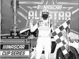  ?? JARED C. TILTON/GETTY ?? At least 20,000 spectators saw Chase Elliott win NASCAR’s All-Star race Wednesday.