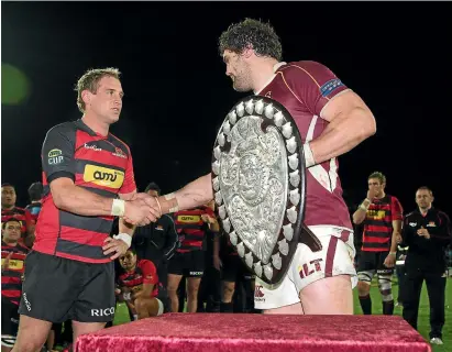  ??  ?? Jamie Mackintosh, right, was a key part of Southland teams that enjoyed success with the Ranfurly Shield during his 12 seasons in the deep south.