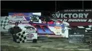  ?? RICK KEPNER - FOR MEDIANEWS GROUP ?? Parker Guldin poses in victory lane after his Sportsman win at Grandview Speedway on Aug. 24.