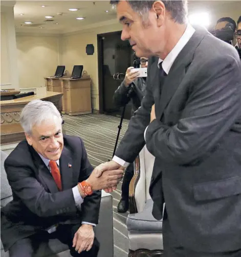  ??  ?? ►El ex Presidente Sebastián Piñera junto al senador Manuel José Ossandón, el 15 de junio pasado.
