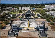  ?? MARK MULLIGAN / HOUSTON CHRONICLE VIA AP ?? The Astroworld main stage where Travis Scott performed Friday and where a surging crowd killed eight people, sits full of debris from the concert, in a parking lot at NRG Center in Houston.