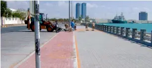  ??  ?? Constructi­on work going on in full swing at the new walkway of the Ras Al Khaimah Corniche. Once complete, the 4km corniche will be better lit and will sport new facilities for children.