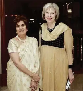  ??  ?? Lilani with British Prime Minister Theresa May.