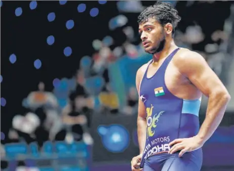  ?? PTI ?? ■ Deepak Punia, who had to pull out due to an ankle injury, was aiming to be only the second Indian after Sushil Kumar to become a world wrestling champion from India.