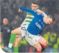  ??  ?? Elyounouss­i tangles with Ryan Jack last Sunday