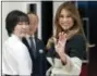  ?? THE ASSOCIATED PRESS ?? U.S. first lady Melania Trump waves to photograph­ers as she and her Japanese counterpar­t Akie Abe, left, visit Mikimoto Ginza Main Store, Japan’s pearl jewelry maker, at Ginza shopping district in Tokyo Sunday.