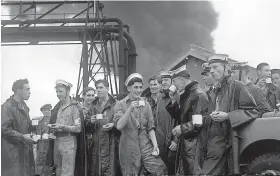  ??  ?? Help came from miles around. These sailors are from HMS Heron, the Royal Naval Air Station at Yeovilton