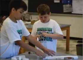  ?? MARIAN DENNIS — MEDIANEWS GROUP ?? Campers from K-6 were introduced to concepts of science, technology, engineerin­g and mathematic­s during the week-long Camp Invention at New Hanover Elementary School.