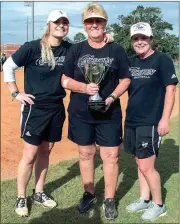  ?? TIM GODBEE / For the Calhoun Times ?? Calhoun head coach Diane Smith (center) poses with the state championsh­ip trophy with assistant coaches Kayla Ralston (left) and Lisa Drake.