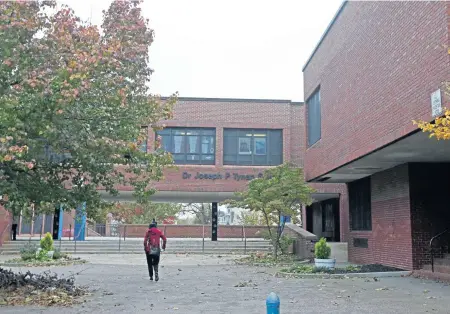  ?? STUART CAHILL / BOSTON HERALD ?? ‘AREN’T NEW’: City Councilors Annissa Essaibi-George, below left, and Michelle Wu both spoke out about the racist graffiti incident at Joseph P. Tynan Elementary School in South Boston, above, yesterday.