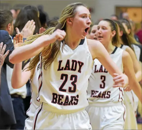  ?? PETE BANNAN-DIGITAL FIRST MEDIA ?? Boyertown’s Abby Kapp (23) celebrates after the Bears’ defeated District 12 champion Cardinal O’Hara in the PIAA Class 6A semifinals Monday night at Spring-Ford. Below, Boyertown’s coach Jason Bieber, center, and the team bench react after Cardinal...