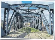  ?? ?? The bridge as it is, needing extensive repairs. No sign remains of a railway track on the bridge.