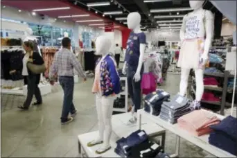  ?? MARK LENNIHAN — THE ASSOCIATED PRESS ?? This Friday photo shows Cat & Jack jeans and tops, made with Repreve polyester fabric created from recycled plastic bottles, on display at a Target store, in New York.