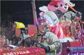  ??  ?? The Rotary Parade of Lights made its way down Commercial Street in New Minas Nov. 16.