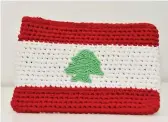  ??  ?? LEBANESE FLAG POUCH
by Decorate&donate
Support a charitable cause and buy one of these quirky hand-knitted pouches. Made by female artisans, full proceeds go to Lebanese families and students in need.
135,000 LBP decoratedo­nate