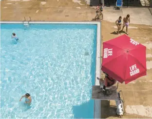  ?? ?? Activity in and around the pool at the Riverview Parks Pool in Lake Station.