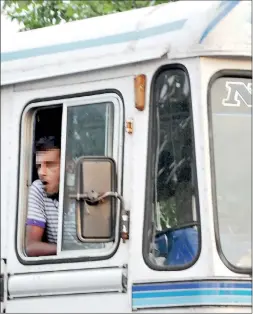  ??  ?? Watch out: A bus driver gets ready to spit out betel.
Pic by Nilan Maligaspe