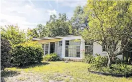  ?? JACOB LANGSTON/STAFF PHOTOGRAPH­ER ?? The owners of this unoccupied “zombie” home are asking about $300,000. Orlando market changes have shifted pressures for producers of “Zombie House Flippers.” Rising home prices, higher labor expenses and rising materials costs have cut into flippers’...