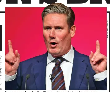  ??  ?? Gleamy-eyed obsessive: Keir Starmer at yesterday’s party conference